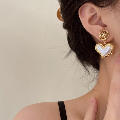 Design high-end and caring earrings for women with Xia Xiaozhong temperament and spicy girl accessories. Fashion ear accessories